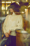 camisola de malha volumosa em cru com gola alta