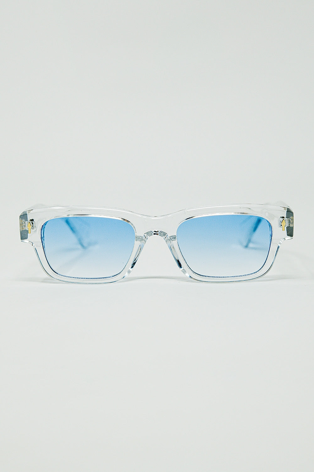 Óculos de sol brancos translúcidos com lentes ovais azuis claras