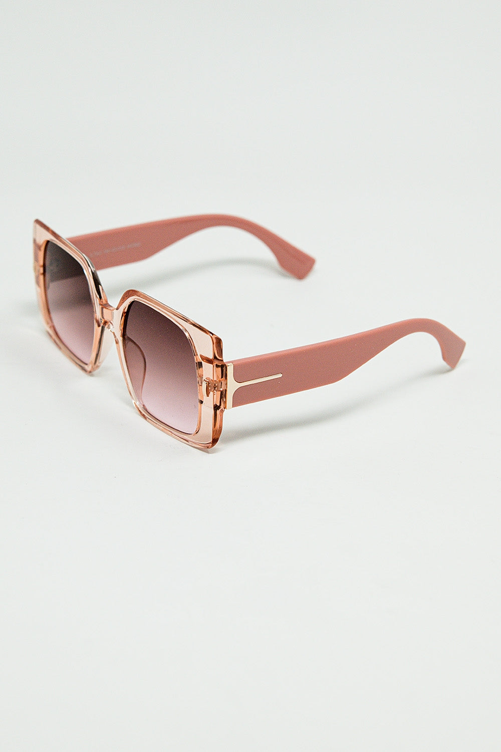Óculos de sol quadrados cor-de-rosa com pormenor dourado na lateral