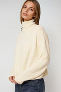 Camisola de gola alta fofa e descontraída em creme