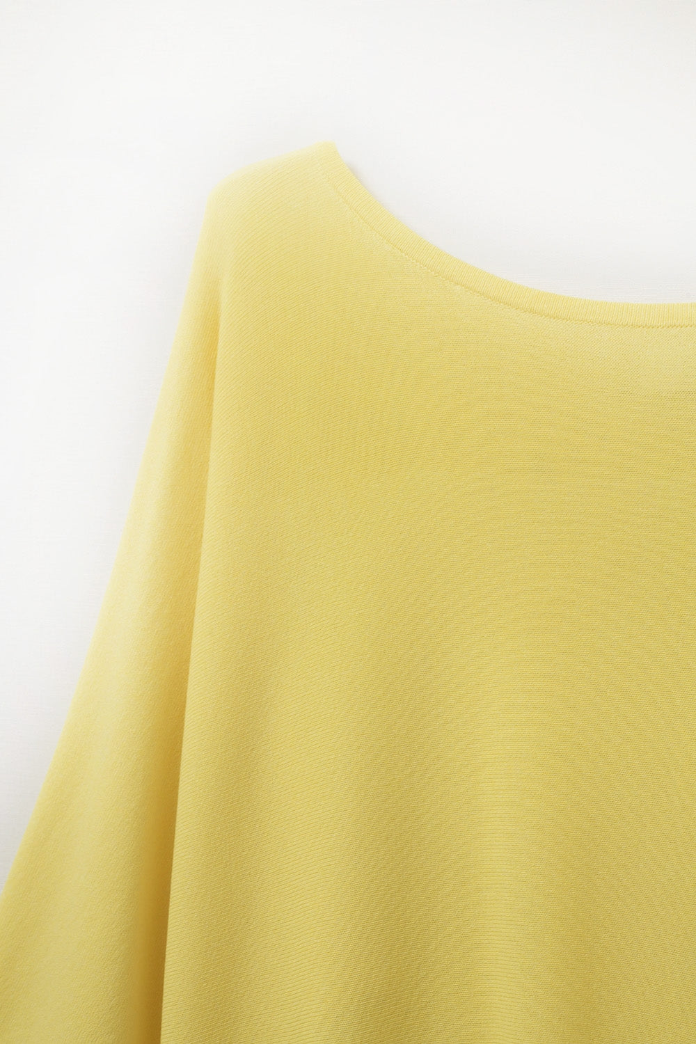 Camisola amarelo oversized com mangas até ao cotovelo
