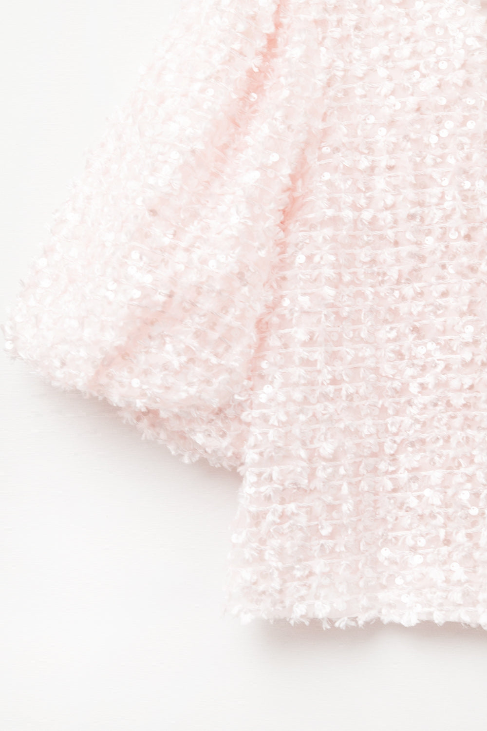 Top rosa com detalhe de lantejoulas e mangas bufantes