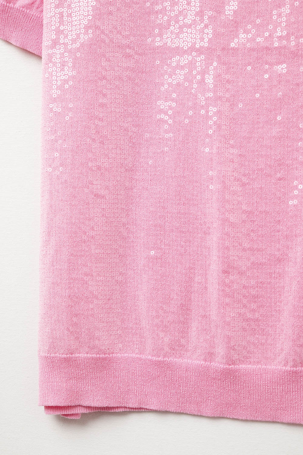 Camisola de lantejoulas cor-de-rosa com gola redonda