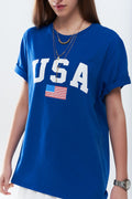Camiseta longa azul solta com logotipo dos USA