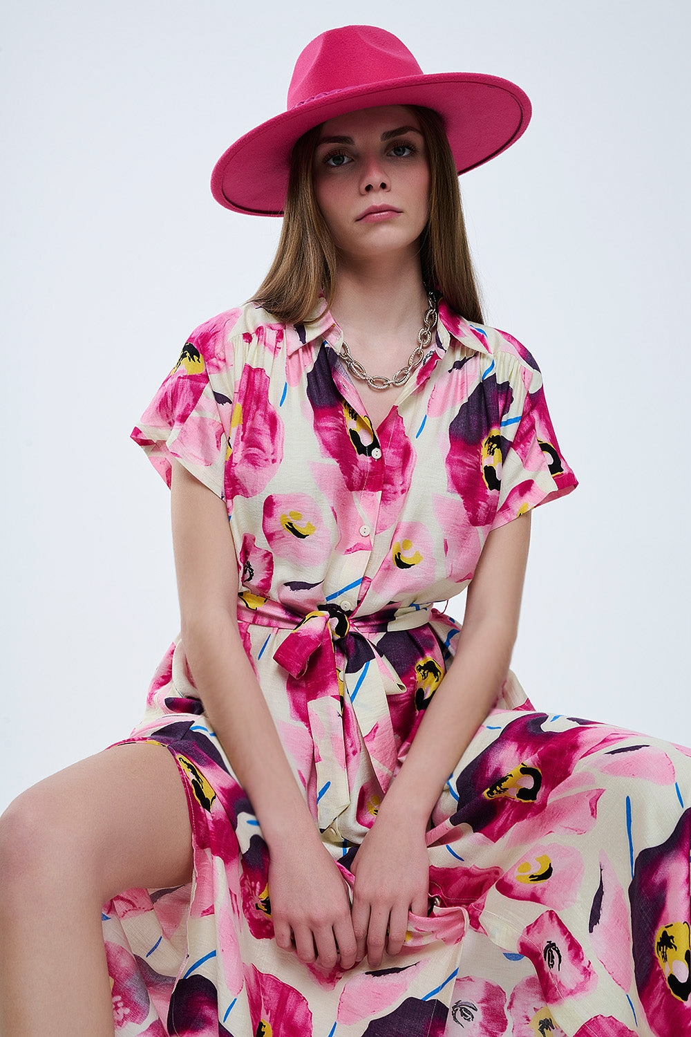 Vestido de camisa com botões com estampado floral em fúcsia
