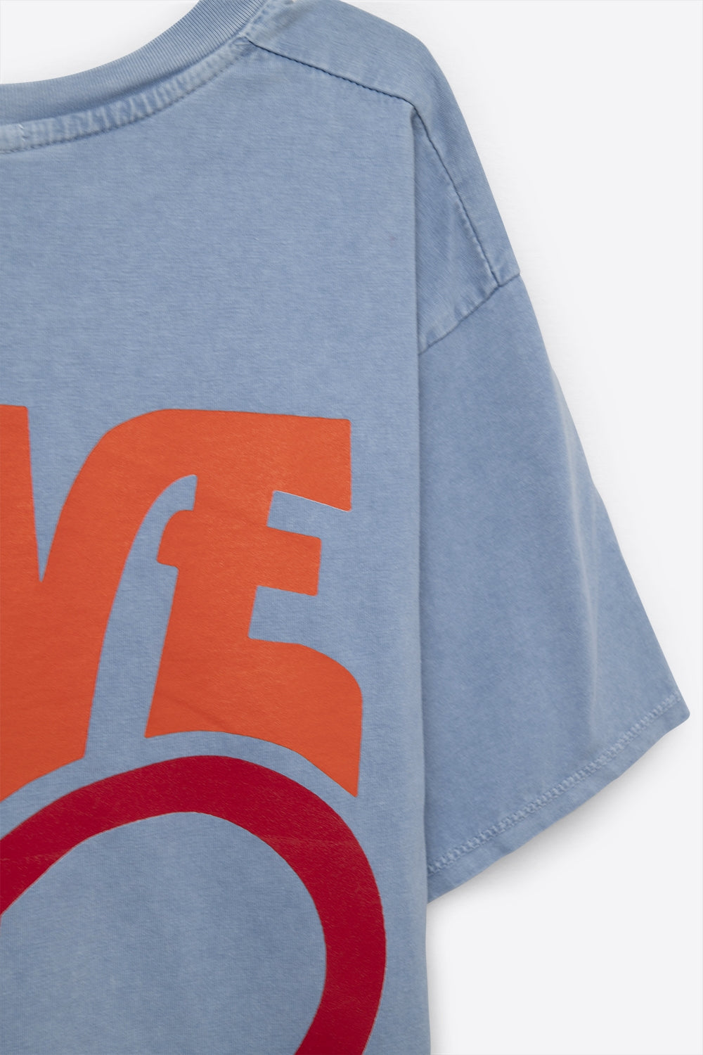 T-Shirt azul fabricada em Itália com o logótipo Love is Air e Heart with Peace