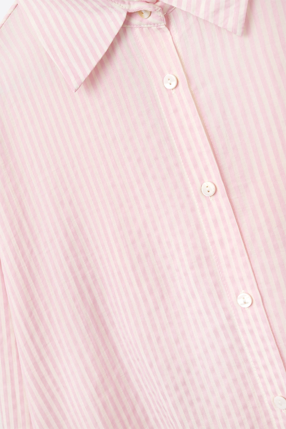 camisa rosa bebé de grandes dimensões com laço nas costas