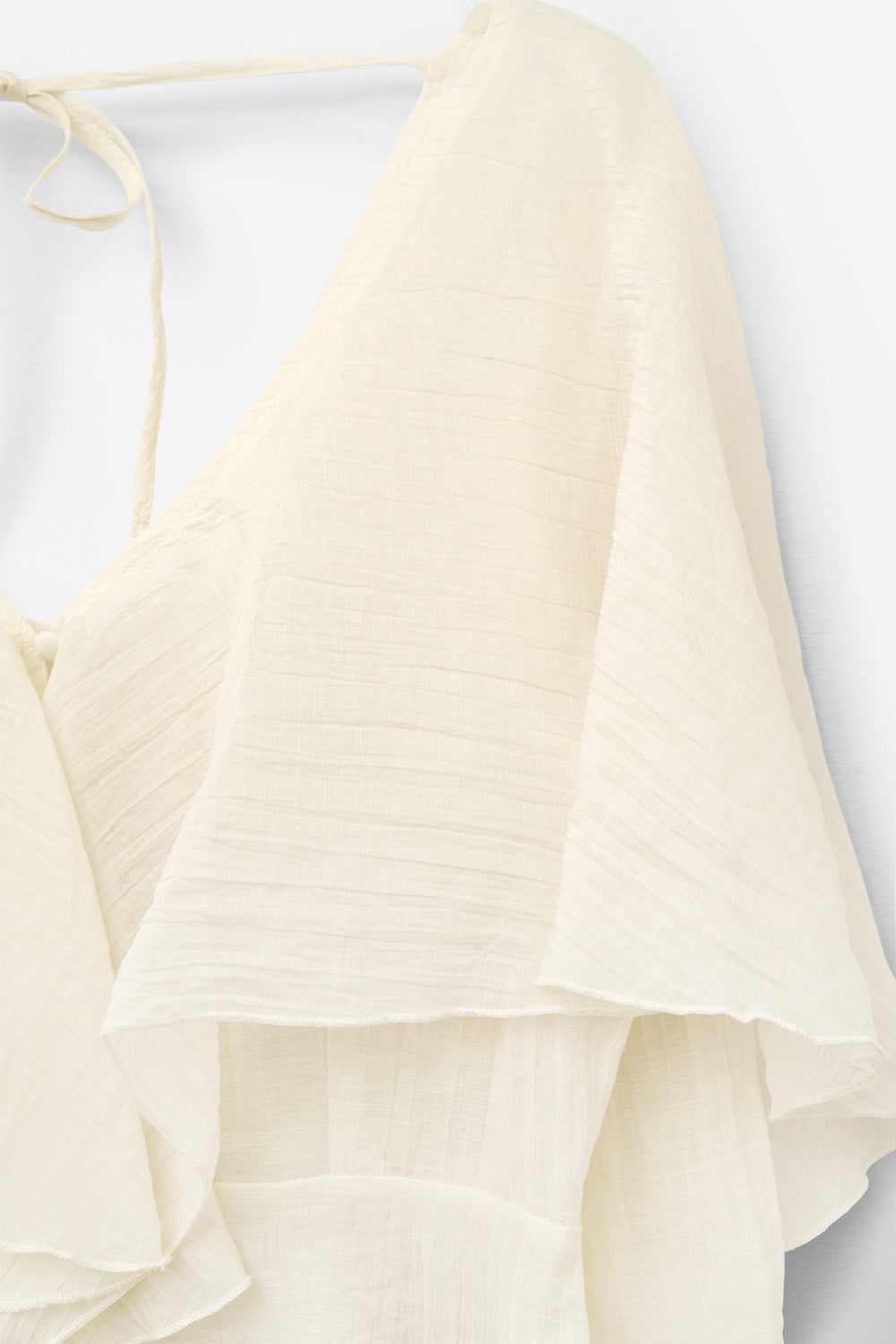 blusa curta em chiffon esvoaçante com mangas compridas