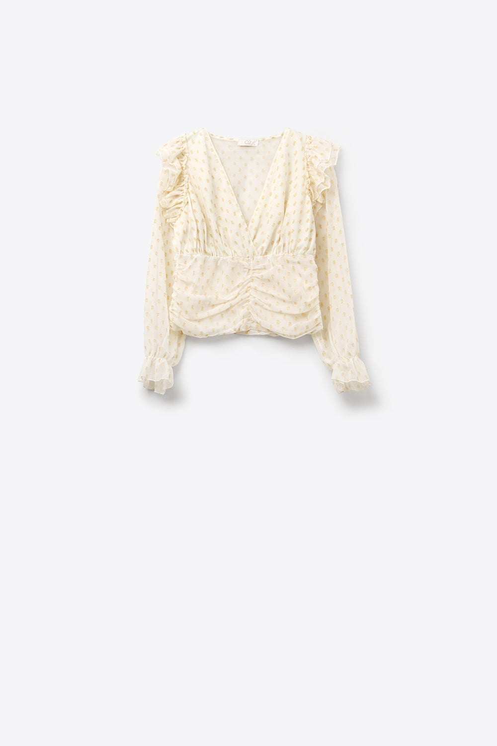 Blusa bege com pontos dourados e pormenores de folhos