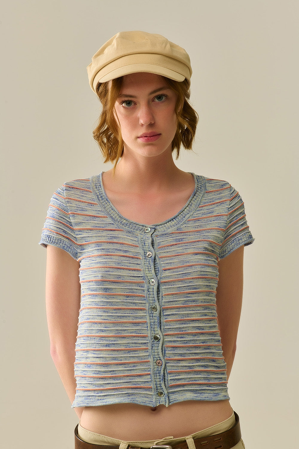 Camisola abotoado em azul com listras laranja