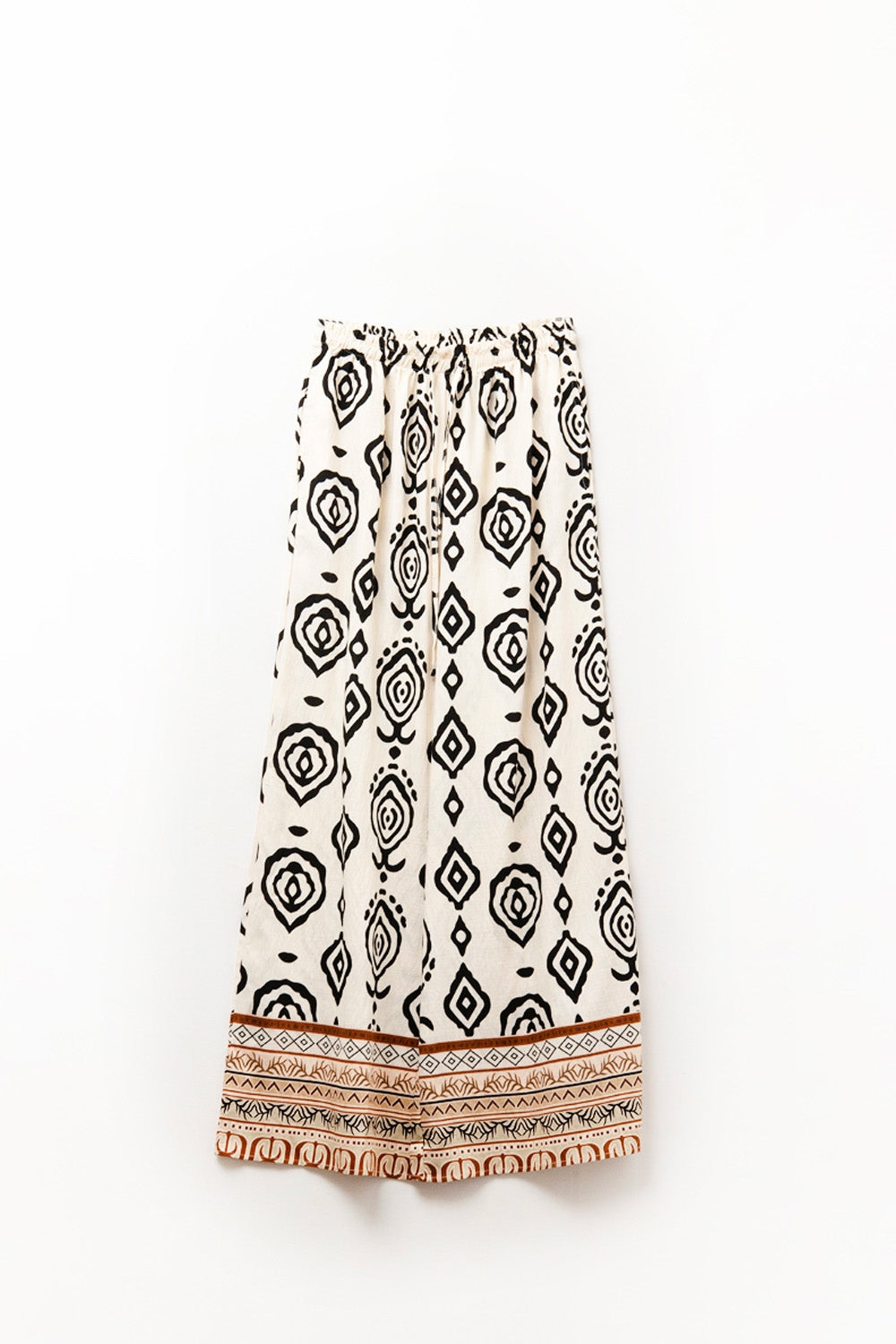 Calças largas creme com estampa boho