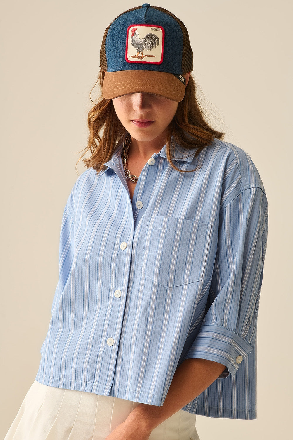 Camisa às riscas com corte oversized em azul