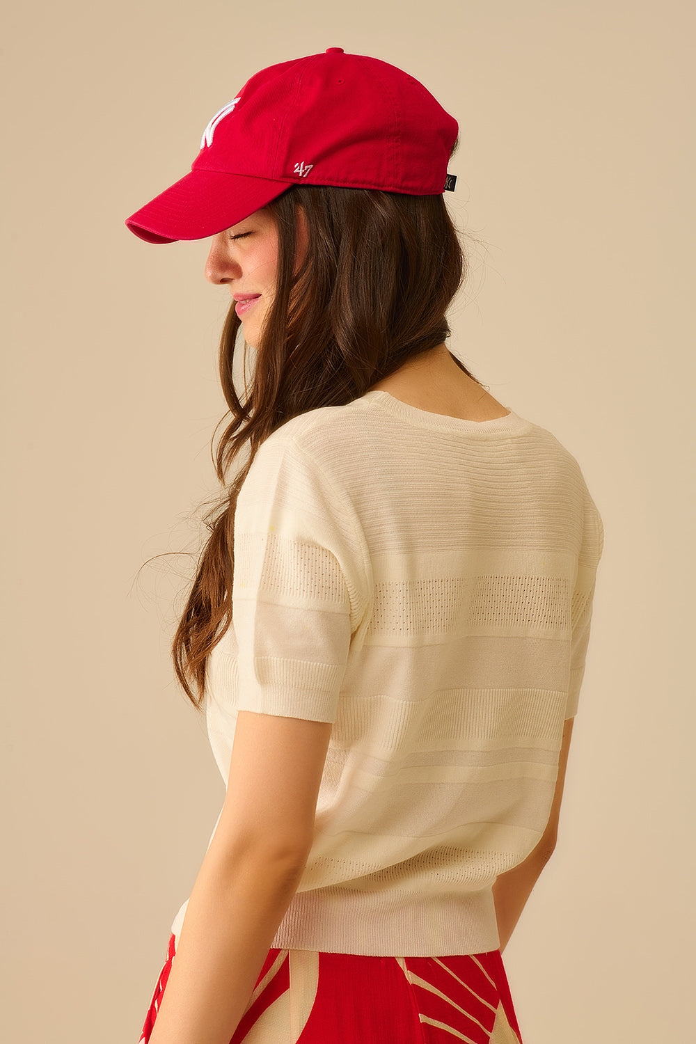Camisola de malha com riscas texturadas em branco