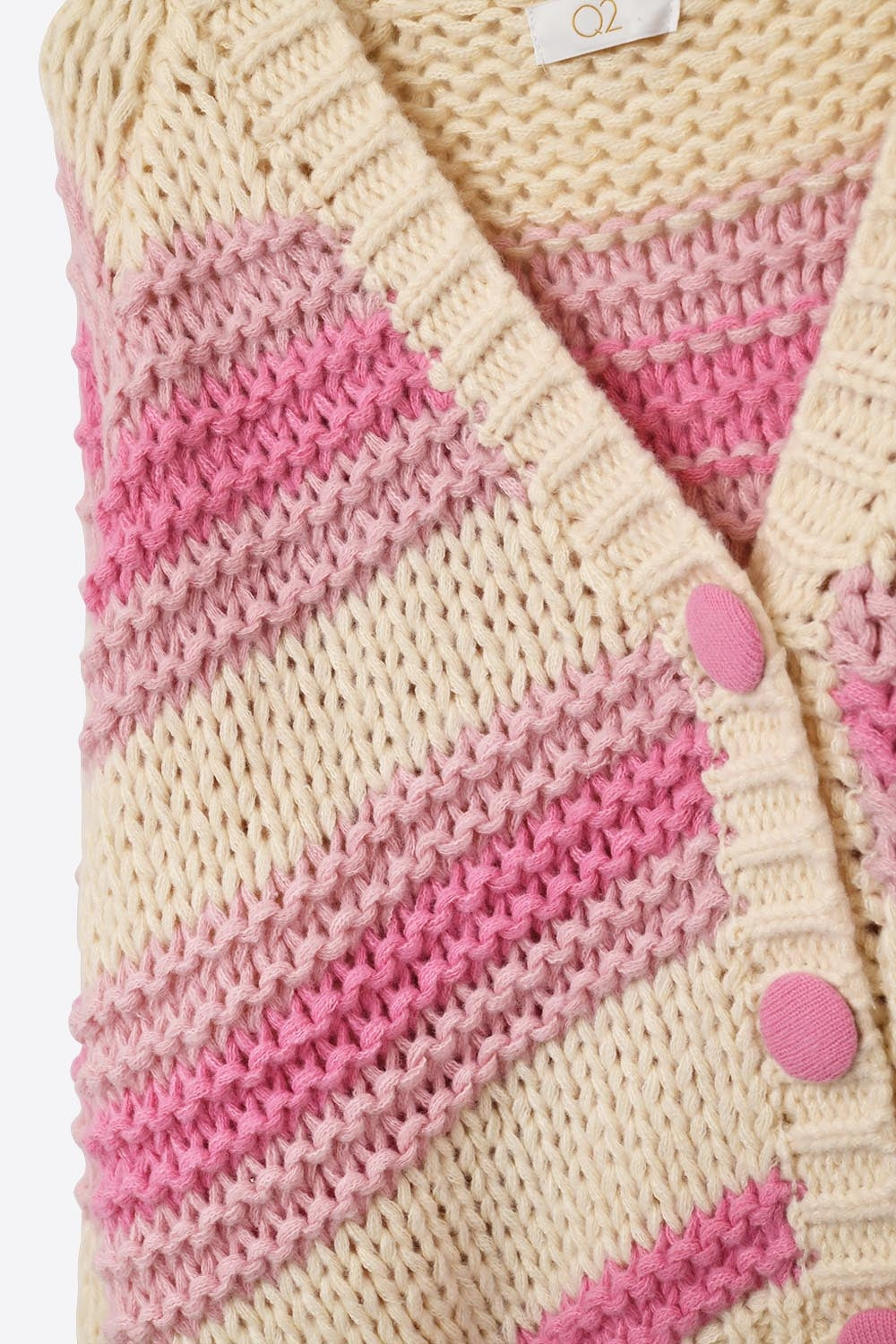 Casaco de malha volumosa com decote em V às riscas cor-de-rosa e creme