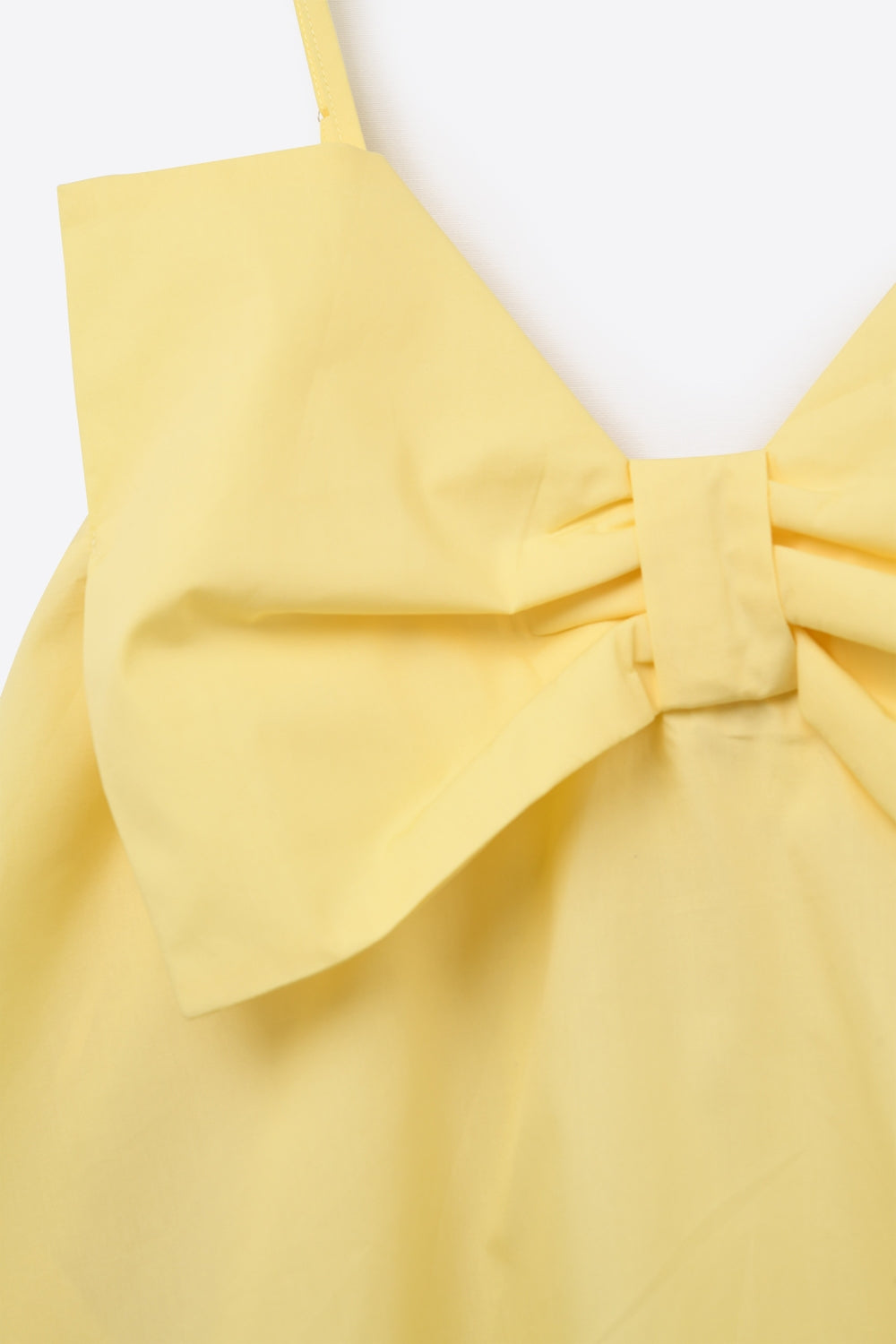Minivestido de popelina amarelo com um grande laço