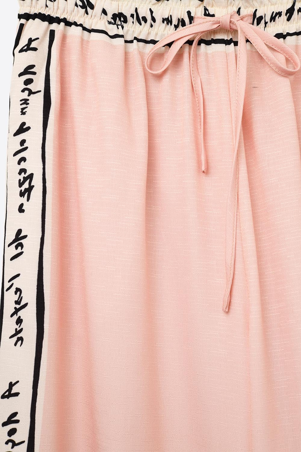 Calças cor-de-rosa com estampado de aguarela de verão