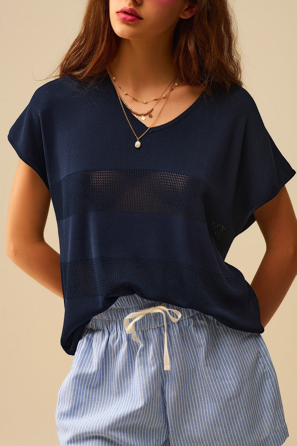 Camisola de malha com riscas azul-marinho