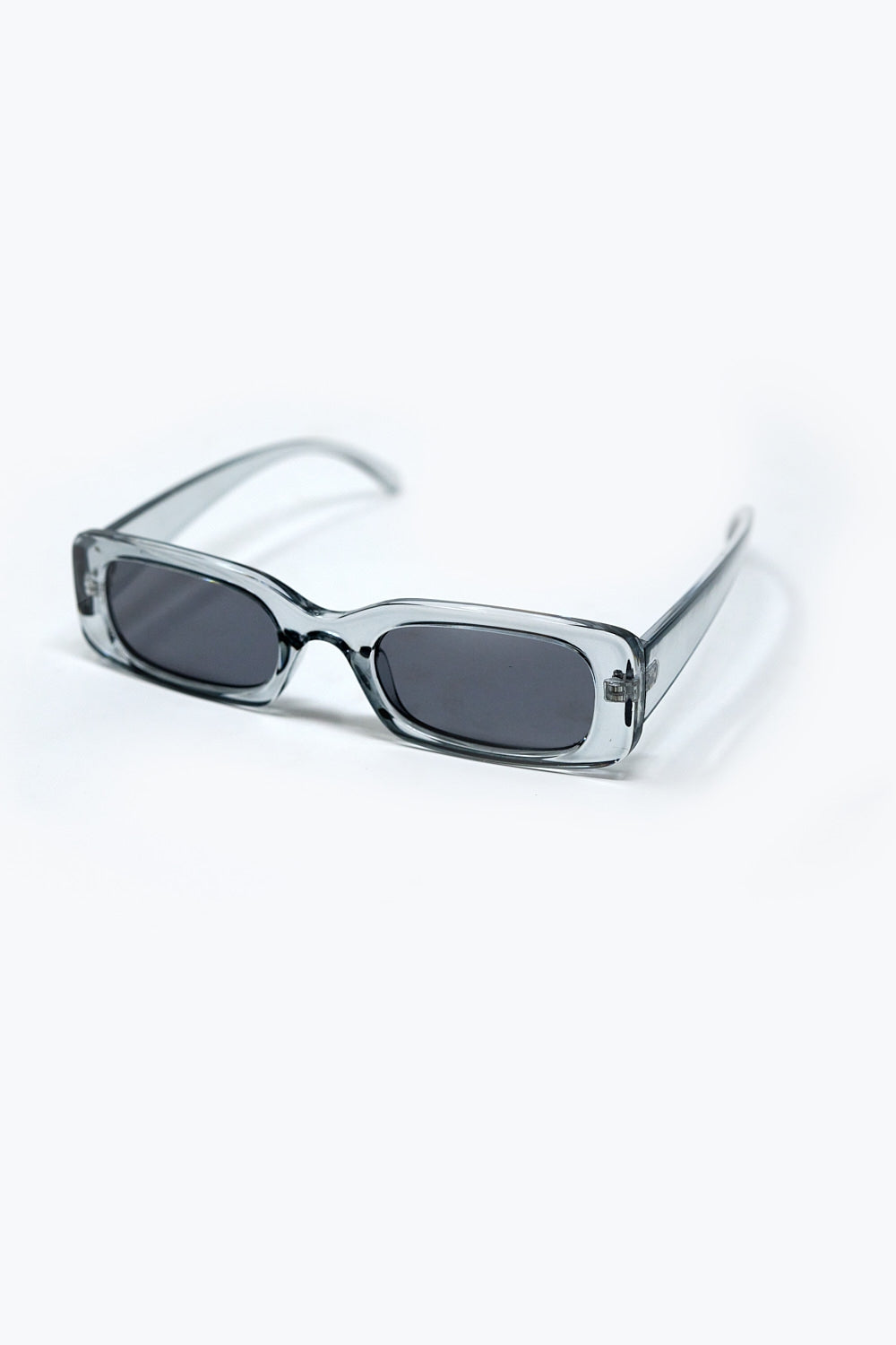 Óculos de sol rectangulares cinzentos transparentes com lentes fumadas escuras