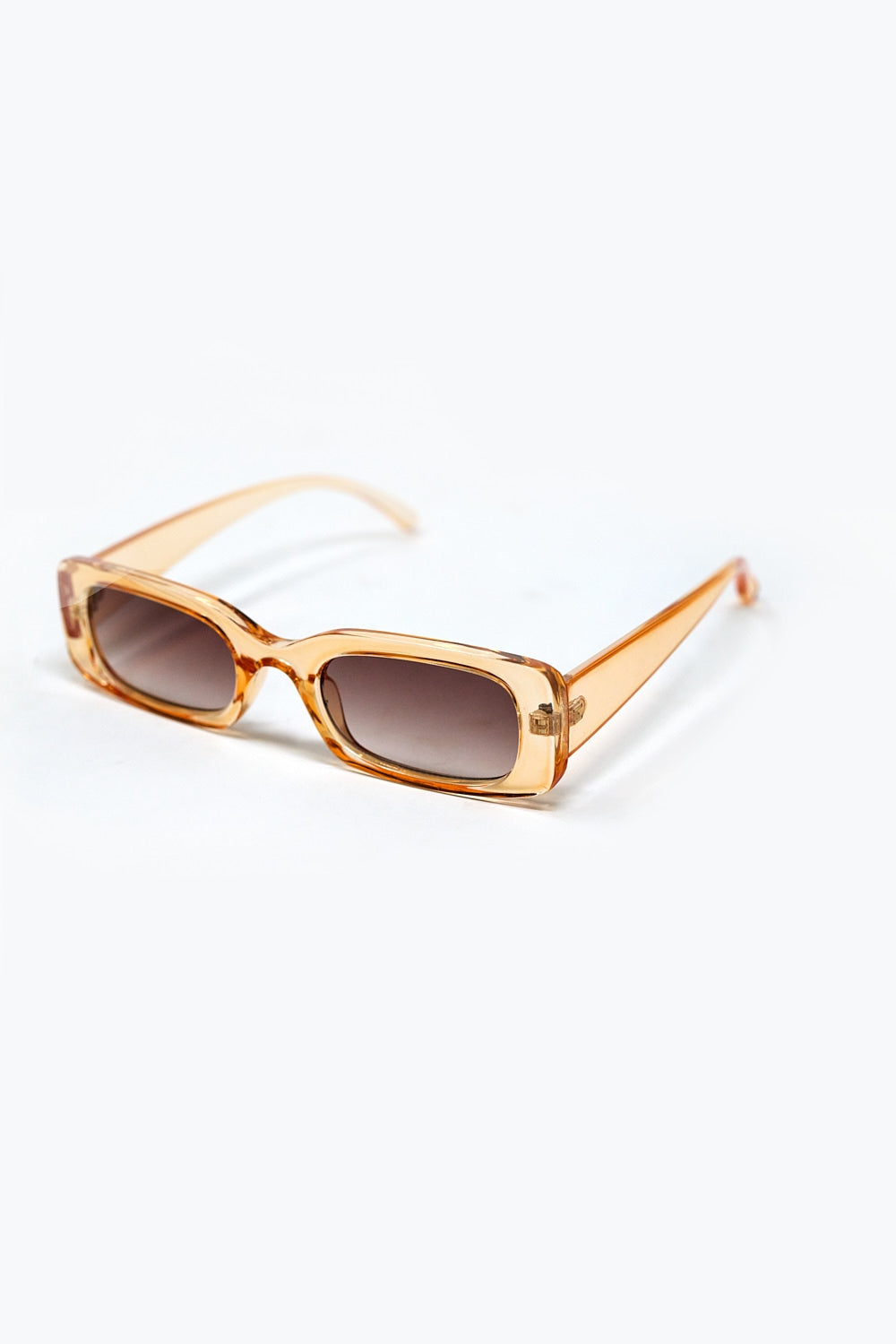 Óculos de sol rectangulares transparentes amarelos com lentes castanhas fumadas