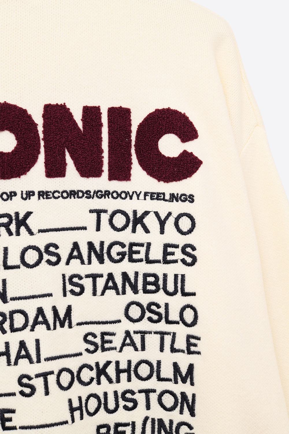 Camisola ICONIC bordada com estampado Global Tour nas costas em creme