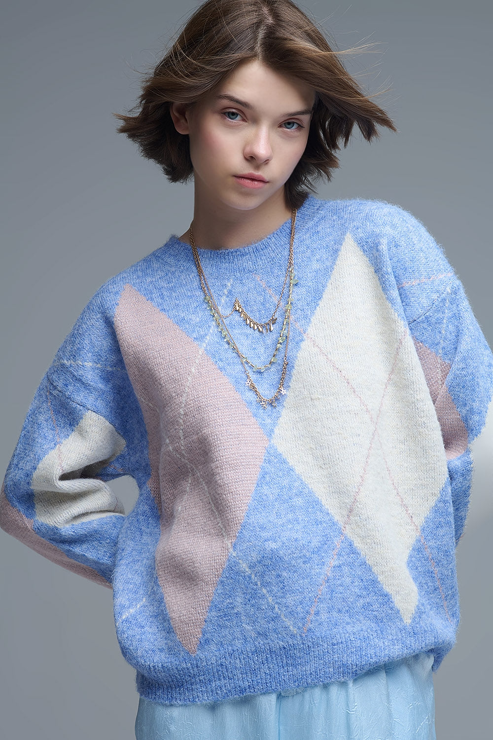 camisola larga em azul celeste com motivos de diamantes