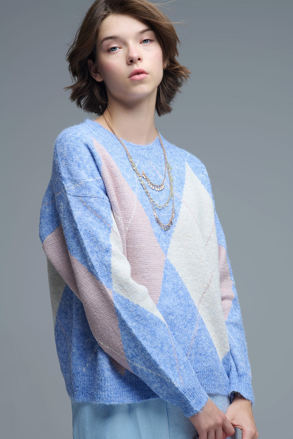 camisola larga em azul celeste com motivos de diamantes