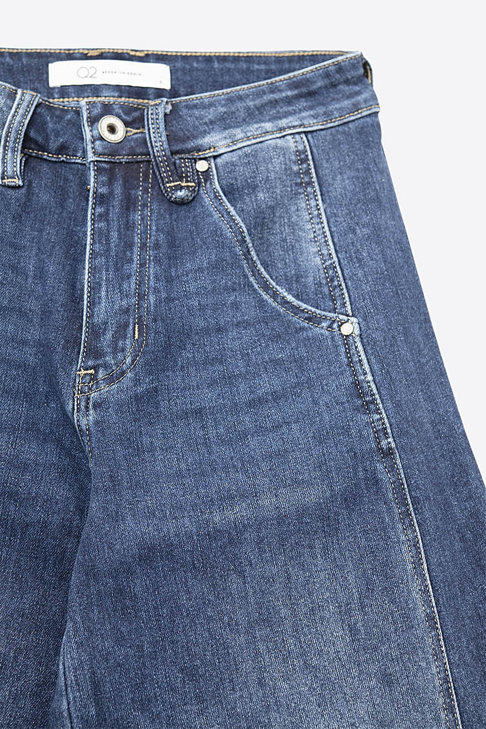 Calças de ganga extra largas em Mid Wash com bolsos laterais