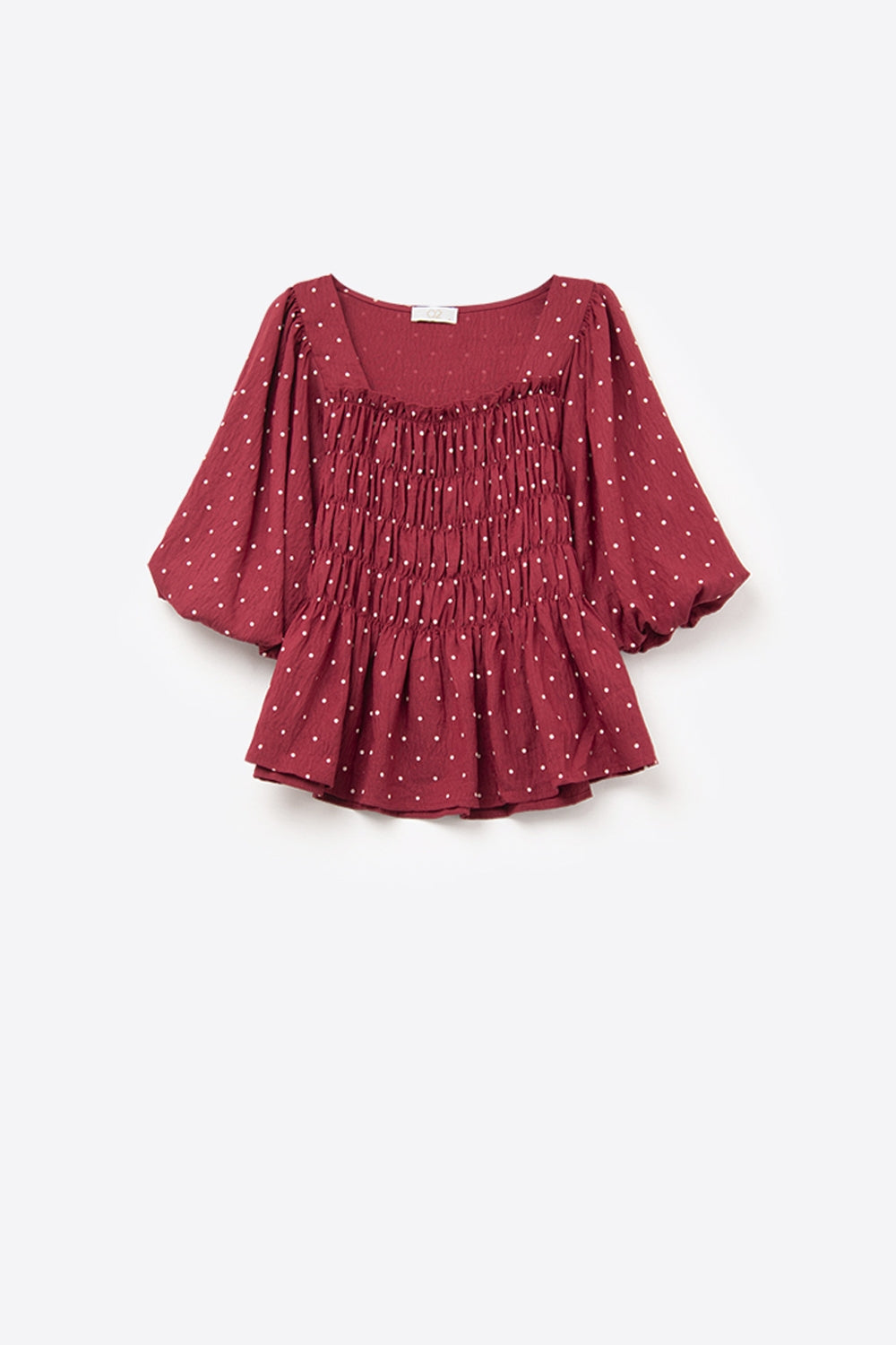 Top vermelho chique às pintinhas com corte na cintura