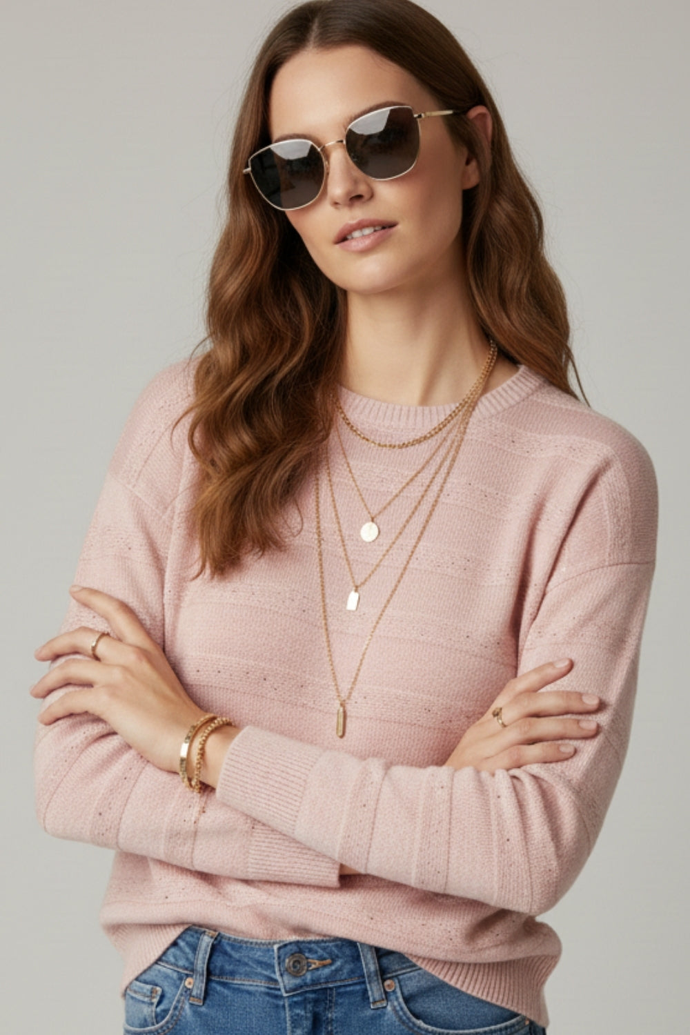 Camisola de malha às riscas cor-de-rosa com pormenores de lantejoulas