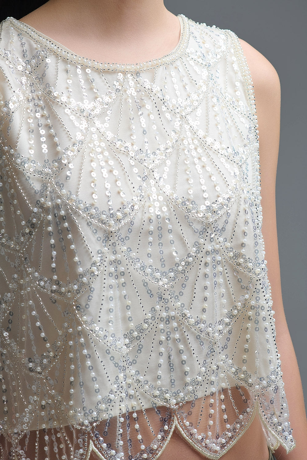 Top com lantejoulas em creme