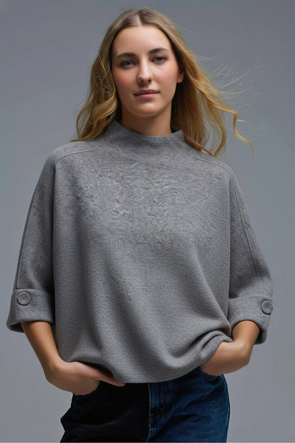 Camisola de malha cinzenta com pormenores de botões