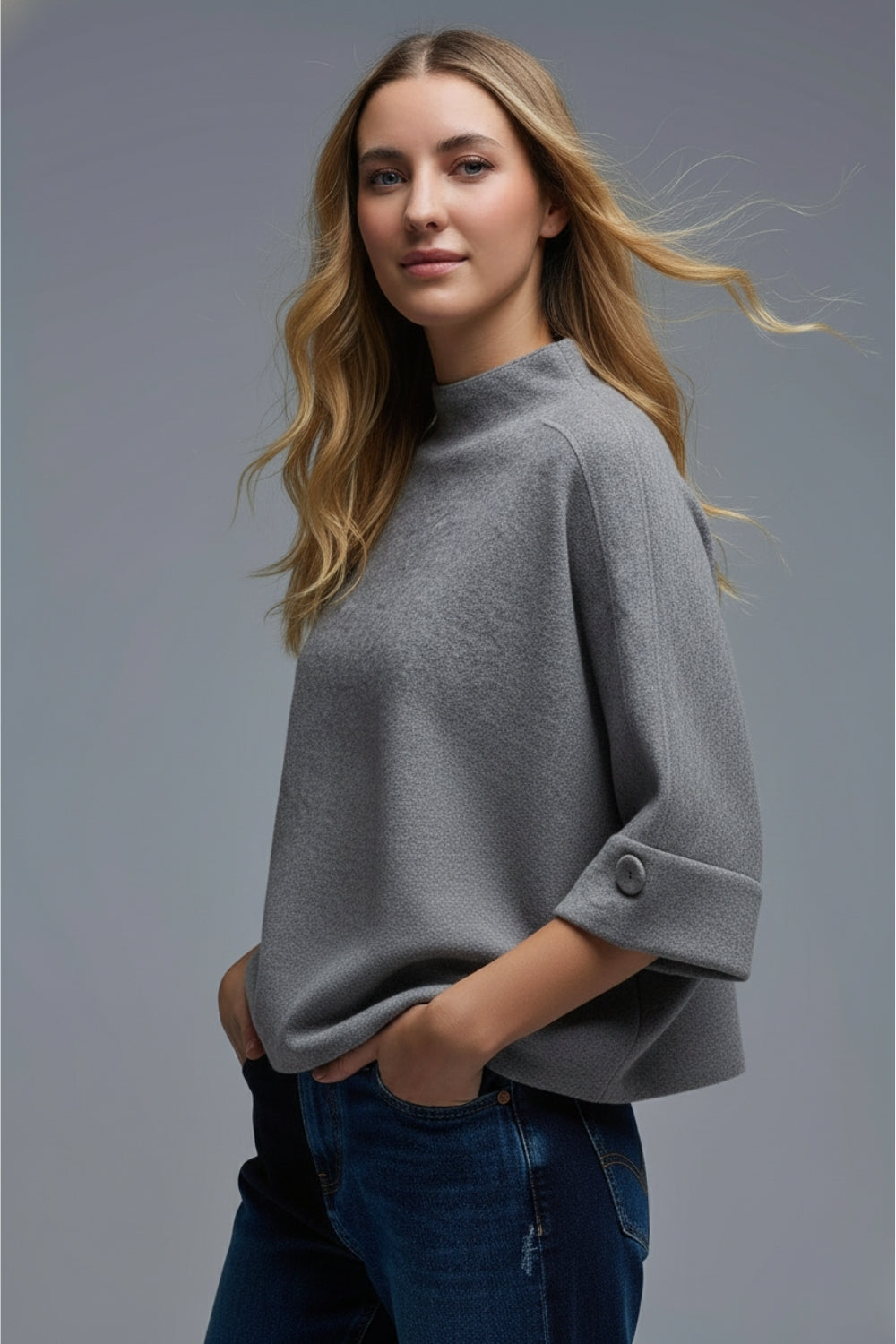 Camisola de malha cinzenta com pormenores de botões