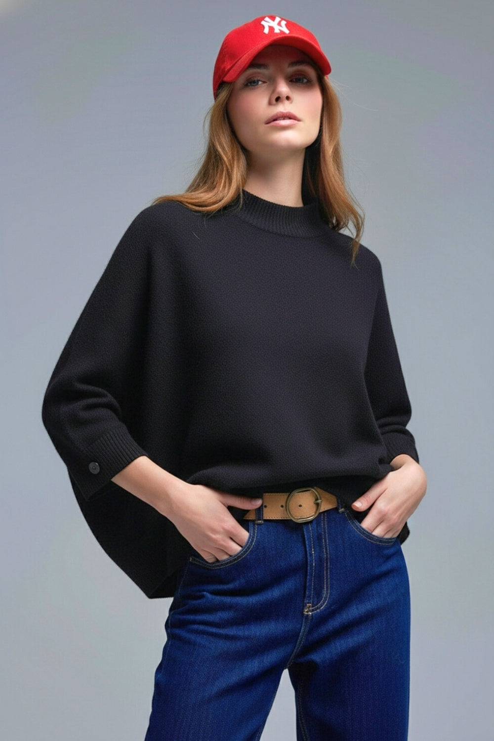 Camisola de malha preta com mangas e pormenores de botões