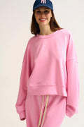 Sweatshirt básica com gola redonda e ombros caídos em cor-de-rosa