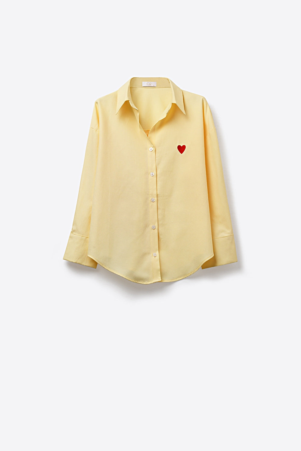 Camisa com botões amarela com pormenor de coração