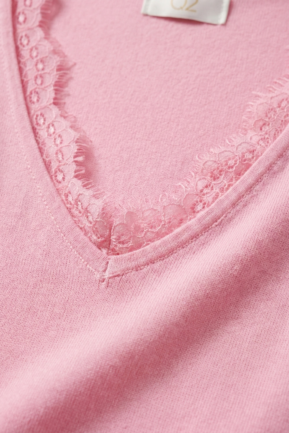 Camisola de malha fina e macia com decote em V e acabamento em renda em cor-de-rosa