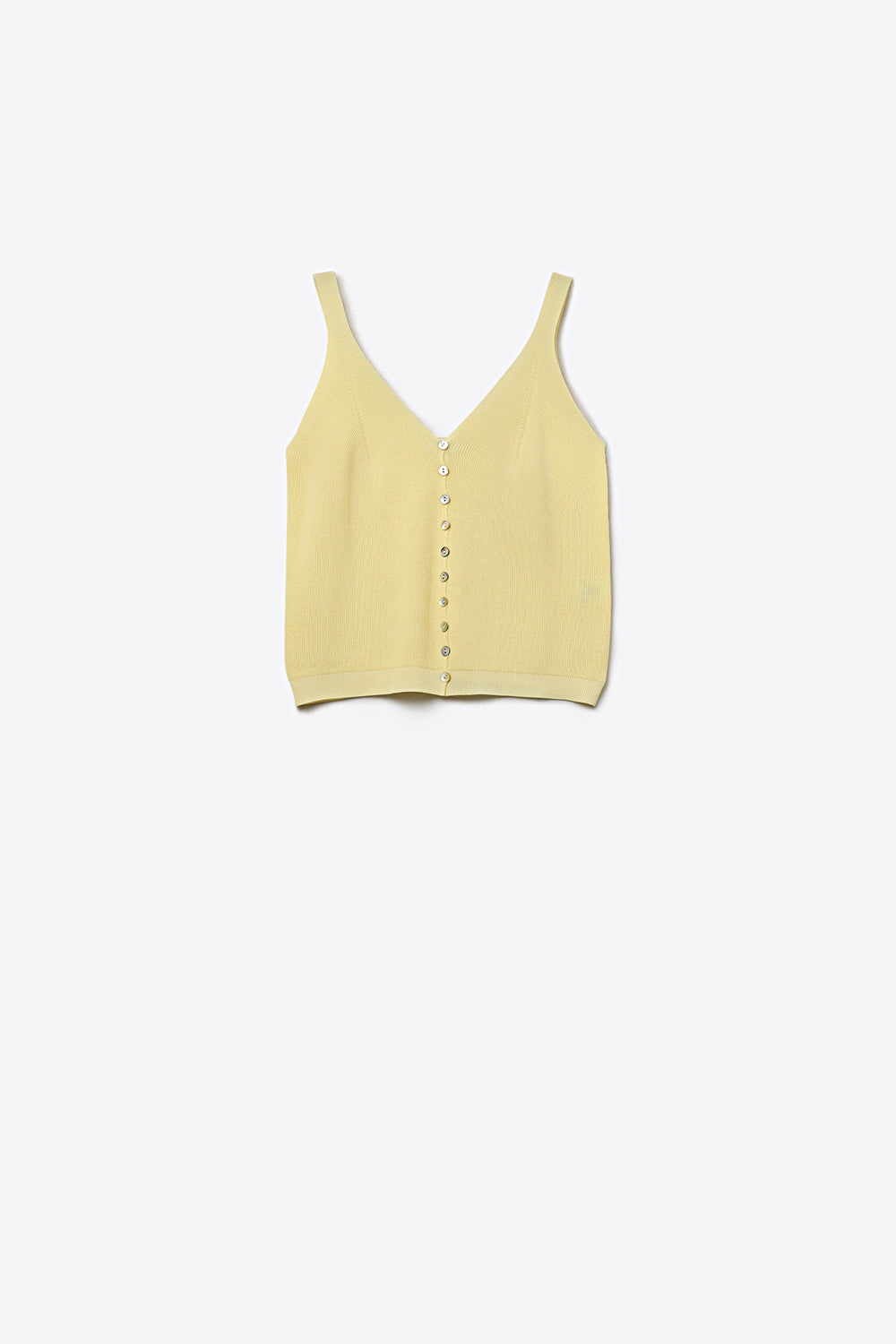Top de malha com botões em amarelo