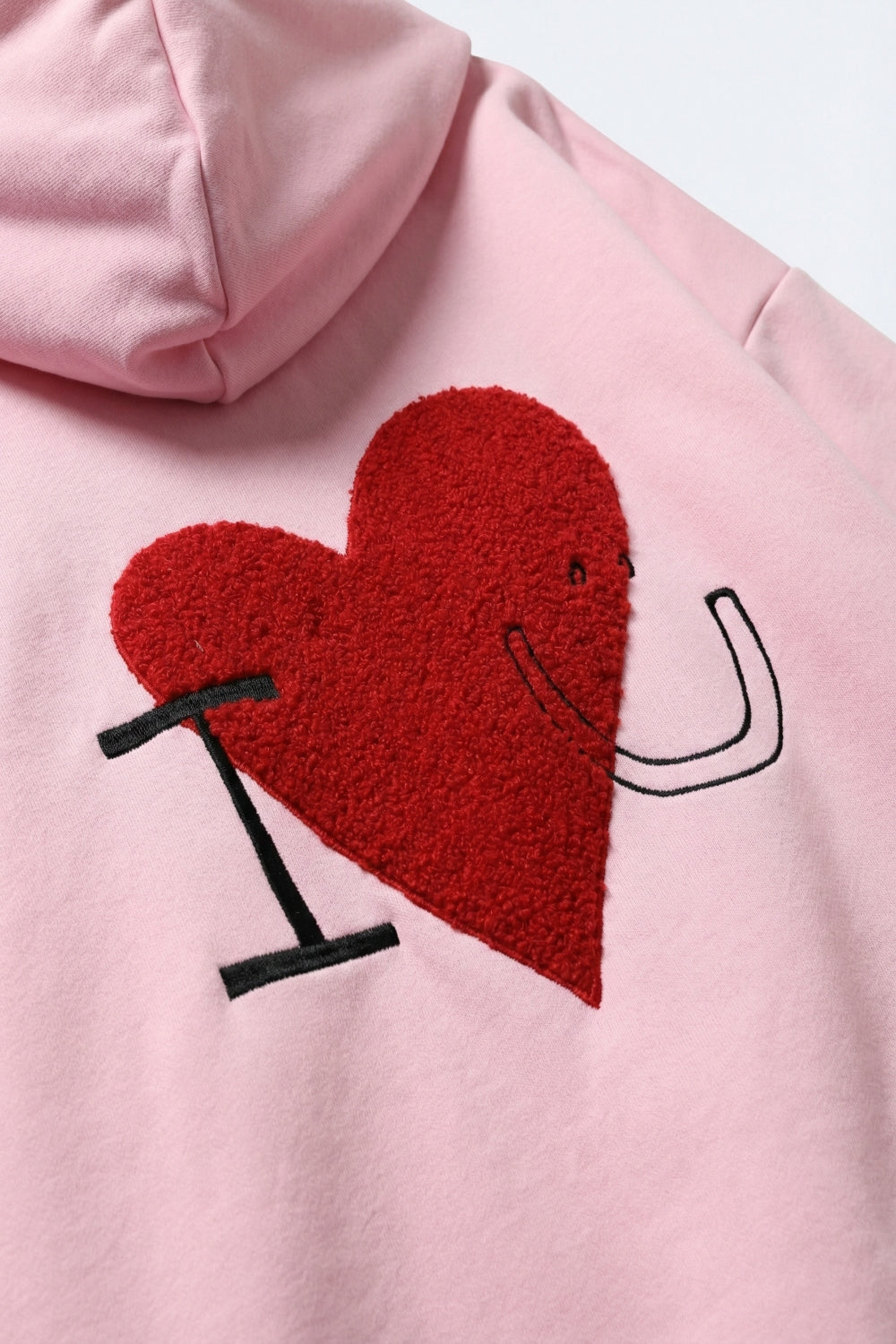 Camisola com capuz super macia rosa bebé com gráfico de corações em bouclé