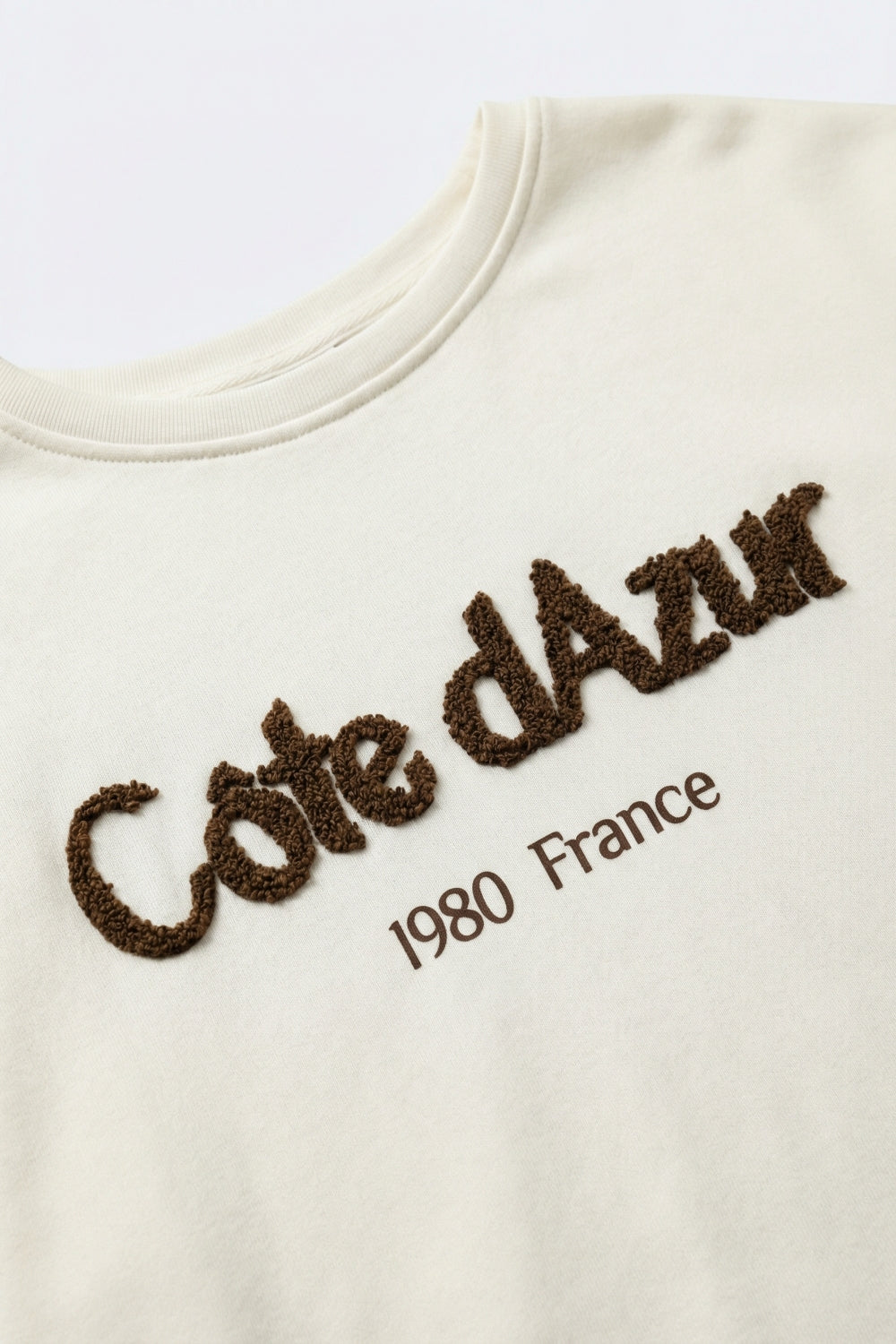 Camisola Côte d'Azur bordada em creme