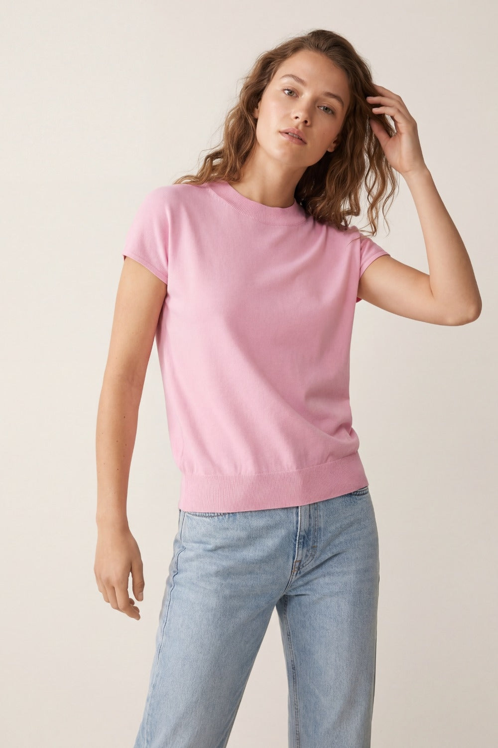 Camisola de gola alta rosa bebé com mangas curtas ajustadas
