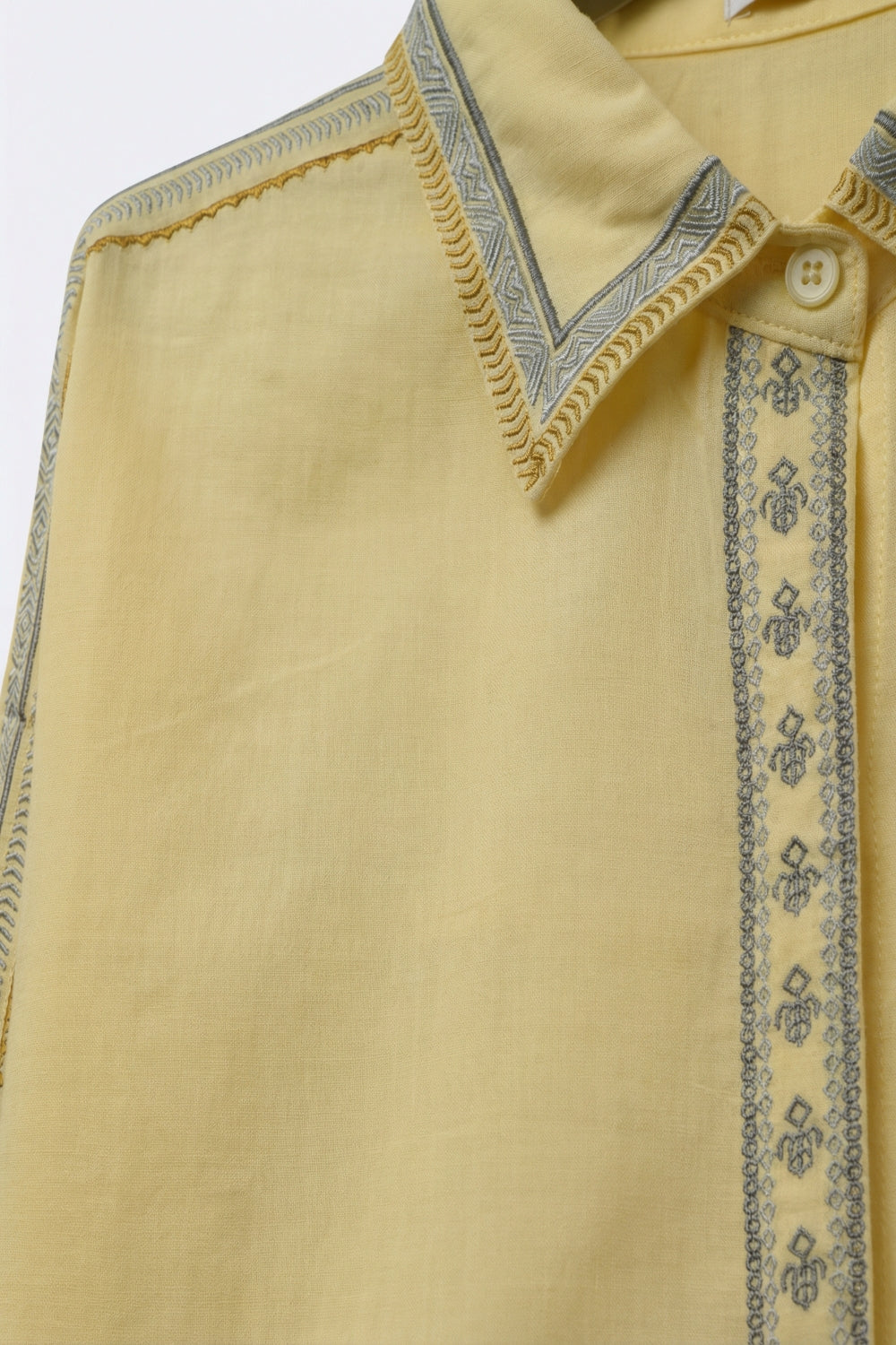 Camisa Oversize amarela com pormenores de guarnição bordados