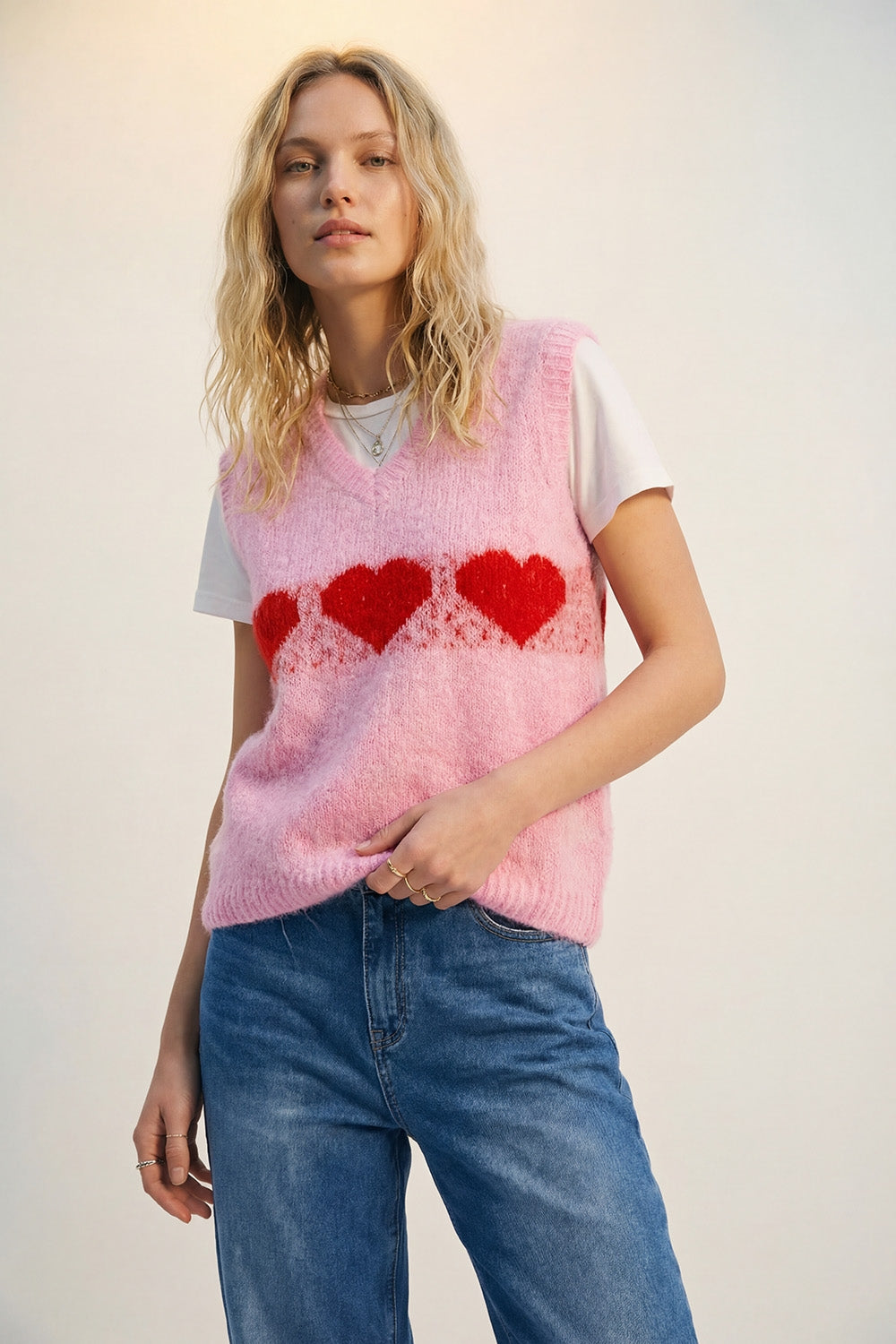 Colete de malha fofo e descontraído cor-de-rosa com motivos em forma de coração