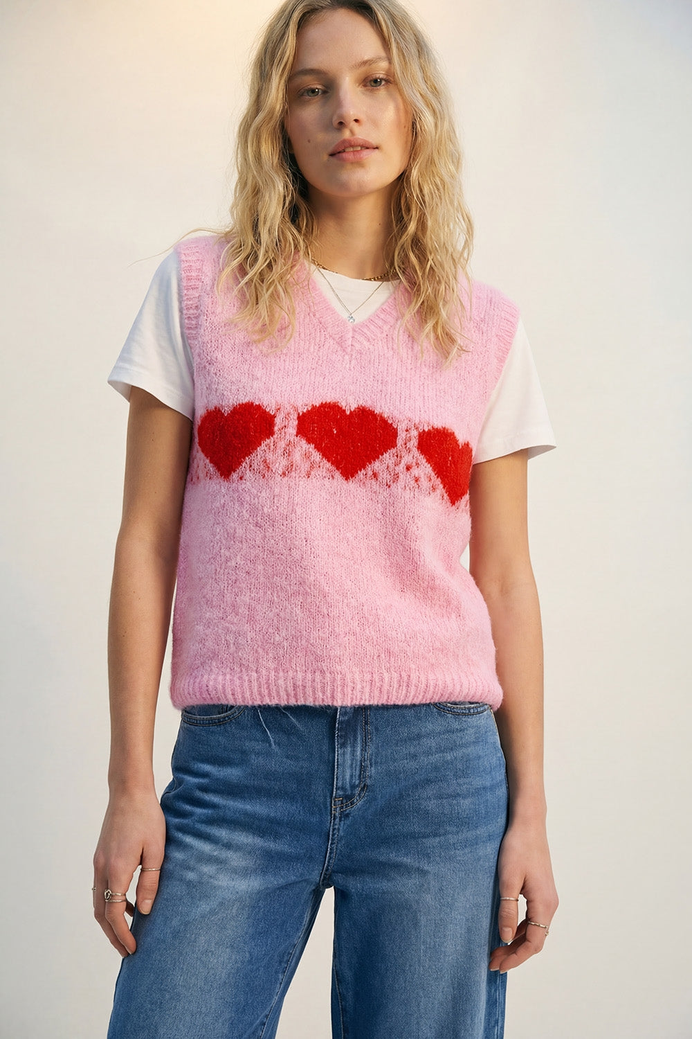 Colete de malha fofo e descontraído cor-de-rosa com motivos em forma de coração