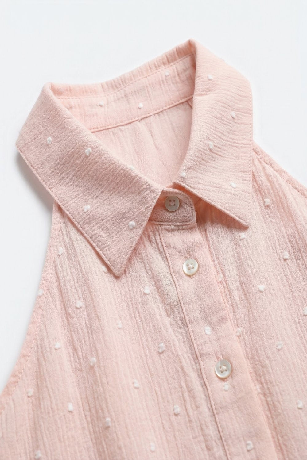 Blusa sem mangas com gola com pontos suíços cor-de-rosa