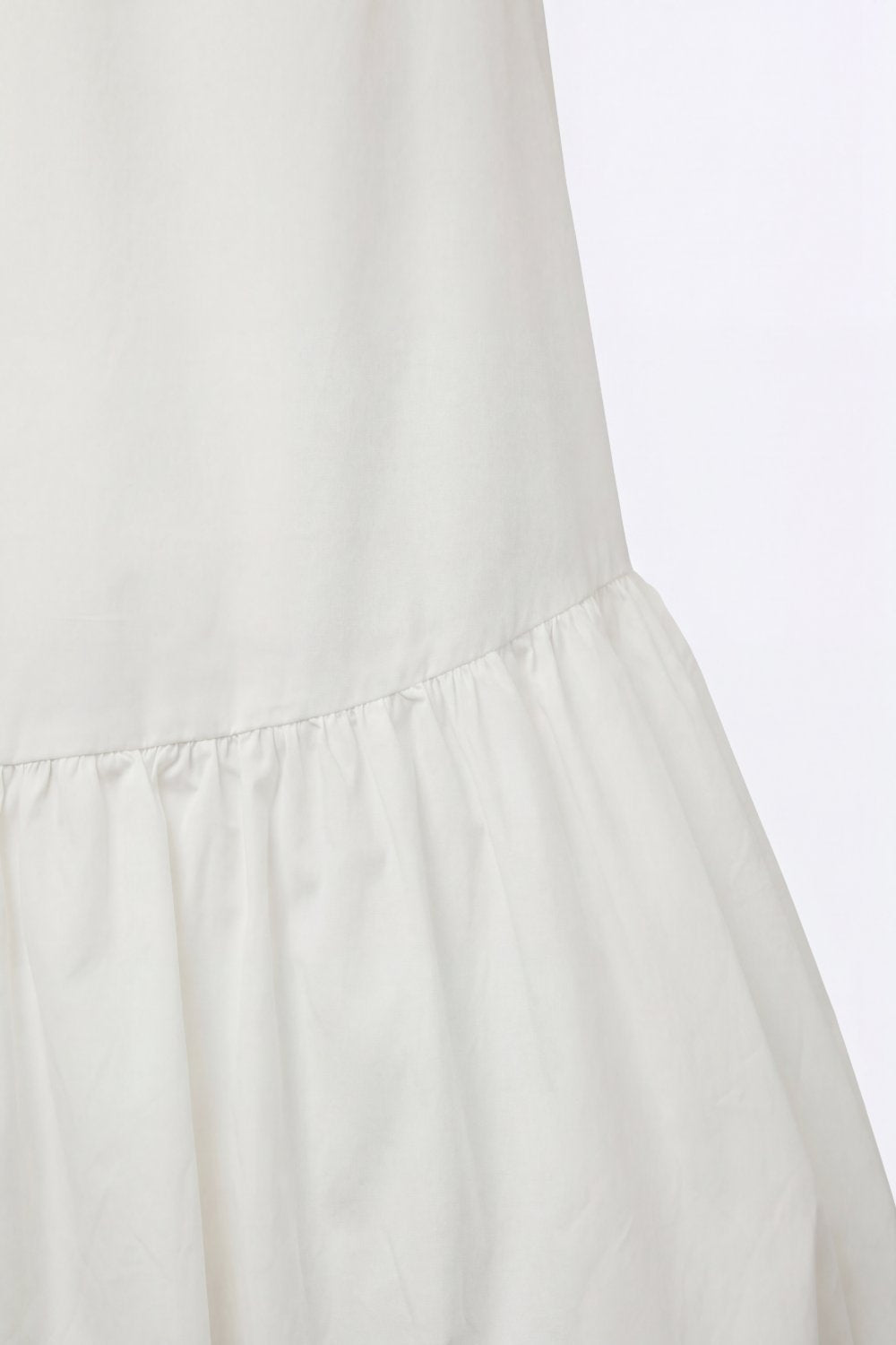 Vestido sem mangas de popeline branco com bainha estilo balão