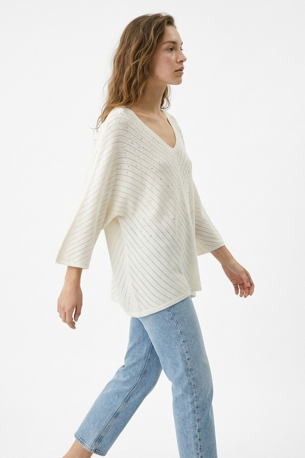 Camisola de malha branca com decote em V embelezada