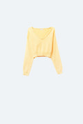 Top curto amarelo com decote em V e manga comprida