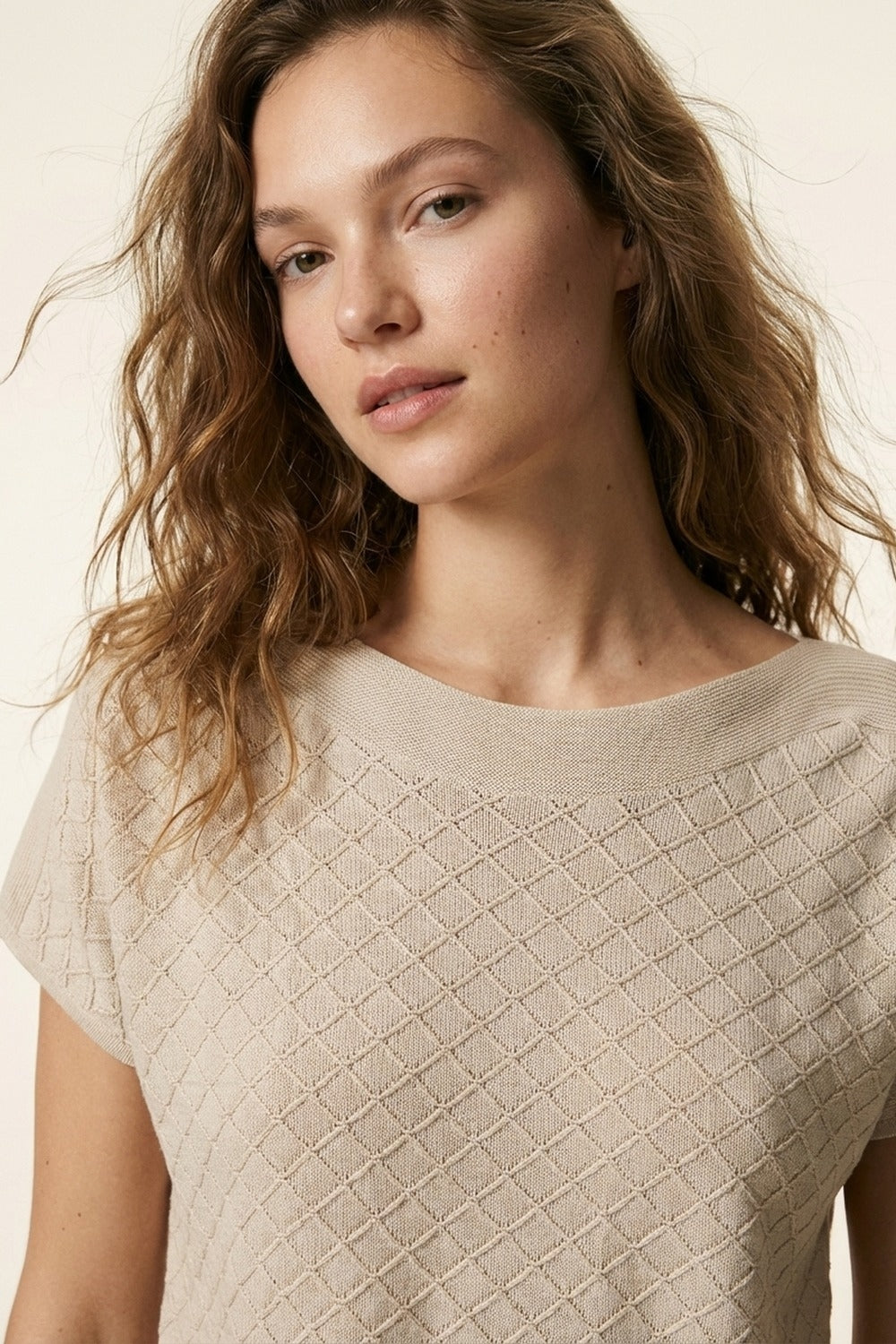 Camisola de manga curta de malha texturizada bege
