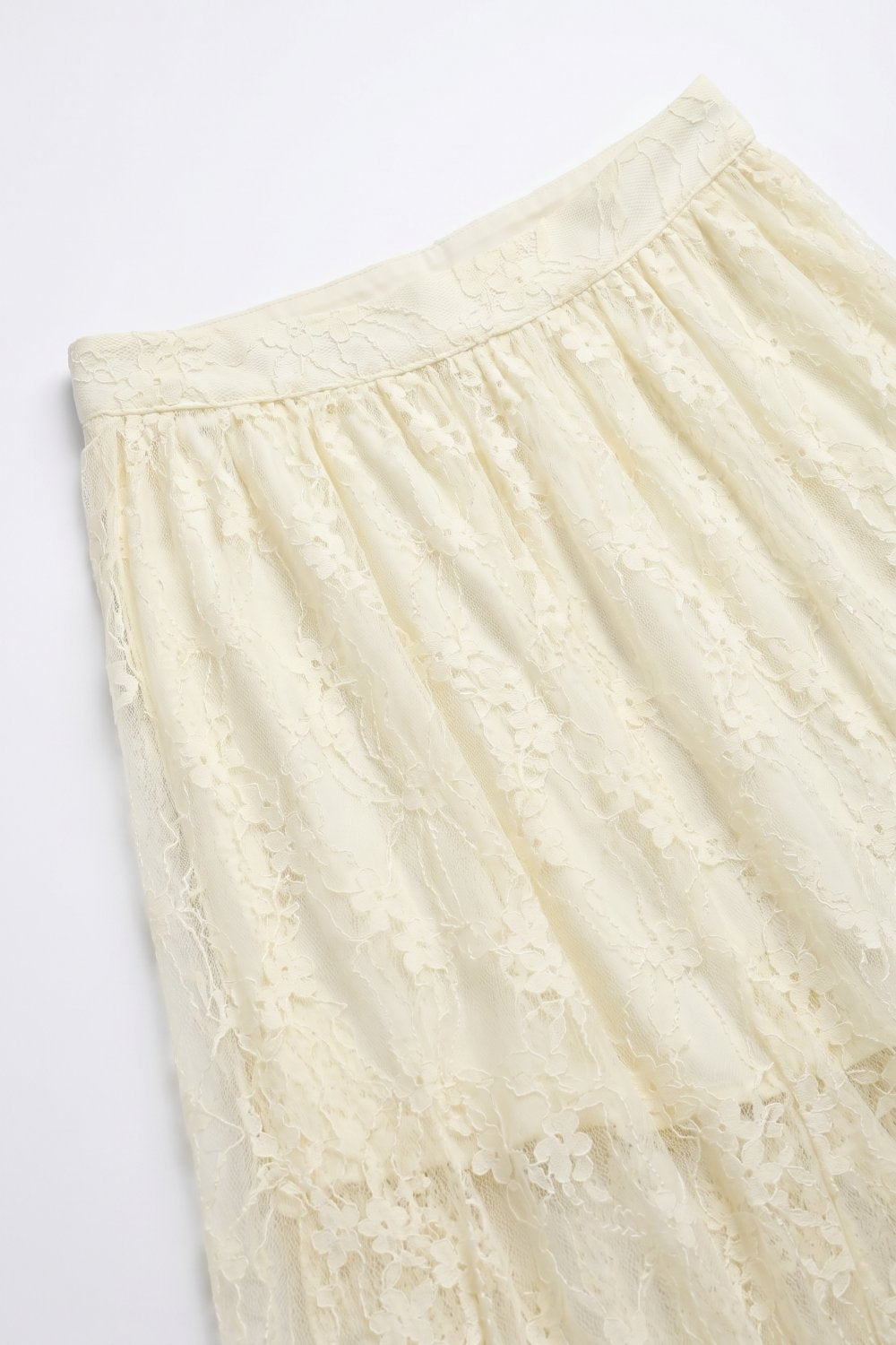 Saia longa de tecido rendado floral creme com cintura elástica