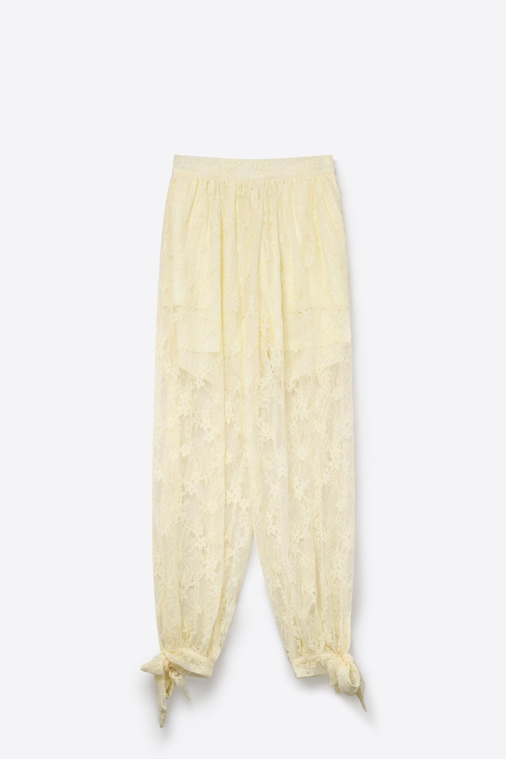 Calças de ajuste descontraído com bainha com laço de renda floral em creme